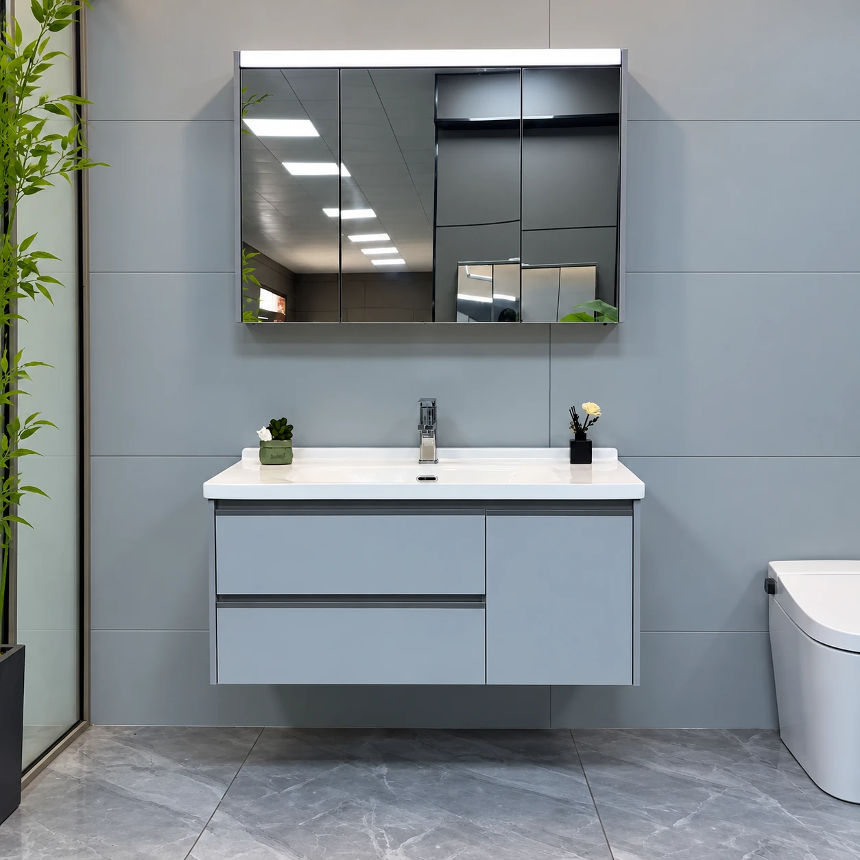 Mueble de baño minimalista azul grisáceo de Nuoju en entorno