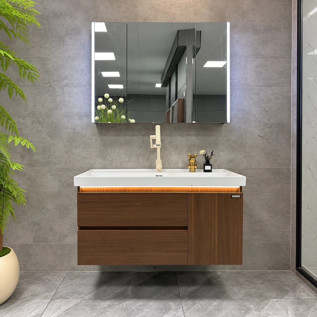 Brown wood grain bathroom vanity with linear light strip - Bathroom Vanity Area